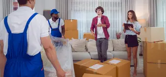 Professional movers providing damage-free handling of furniture and household belongings during relocation